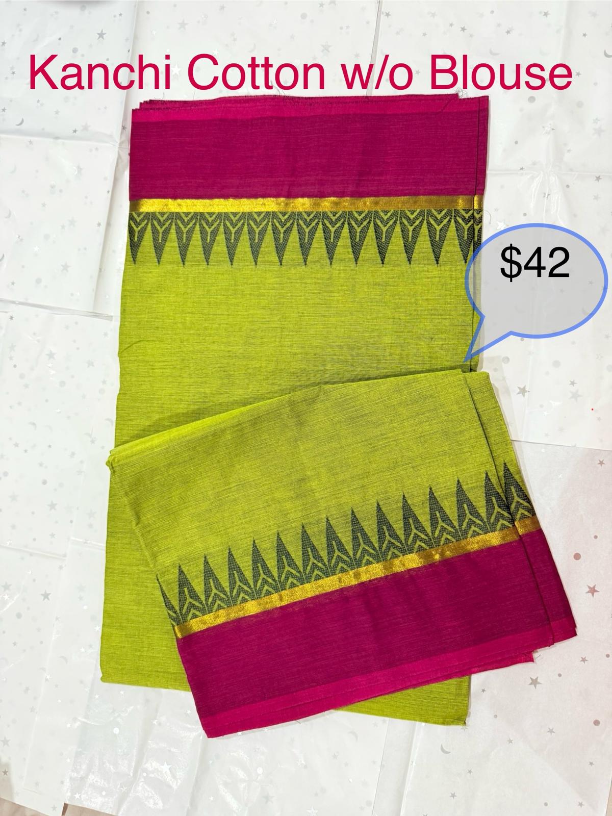 Green Kanchi Cotton saree with pink border on a white background